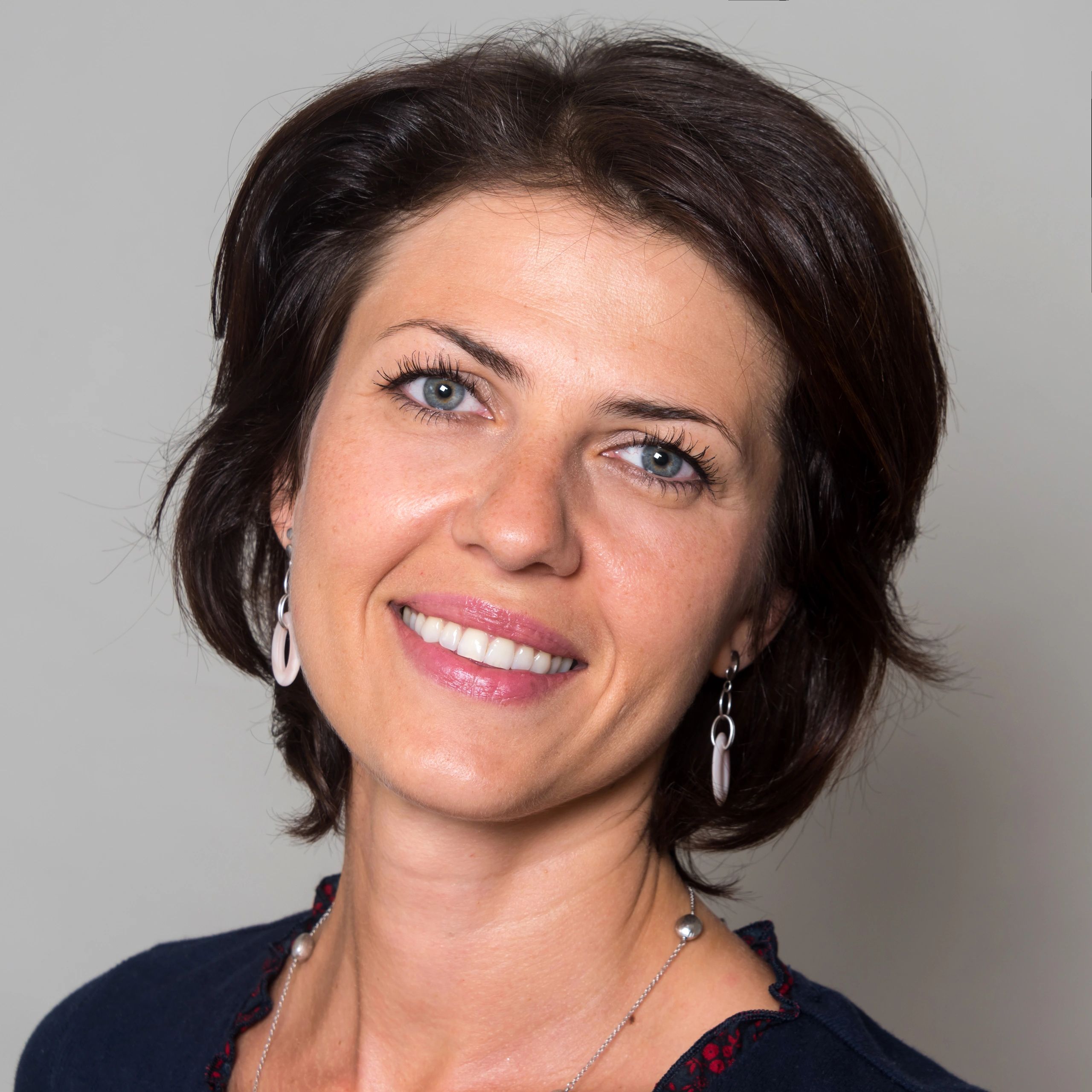 Professional headshot of a satisfied client